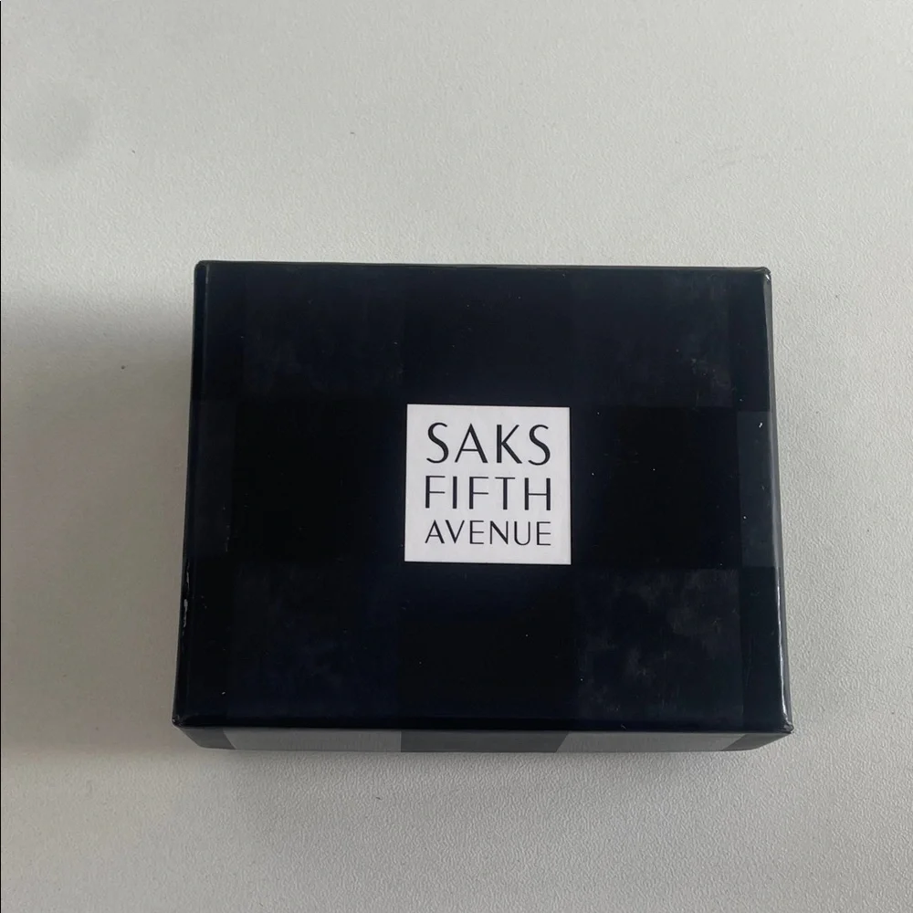 Saks Fifth Avenue Silver Phone Clip